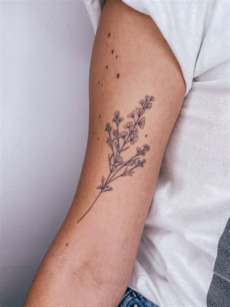 larkspur flower tattoo